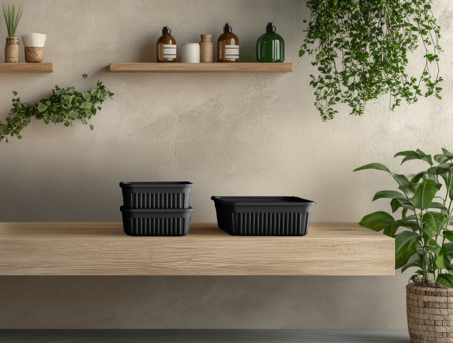 Stapelbare Aufbewahrungskörbe in schwarzem Design für Küche und Badezimmer.